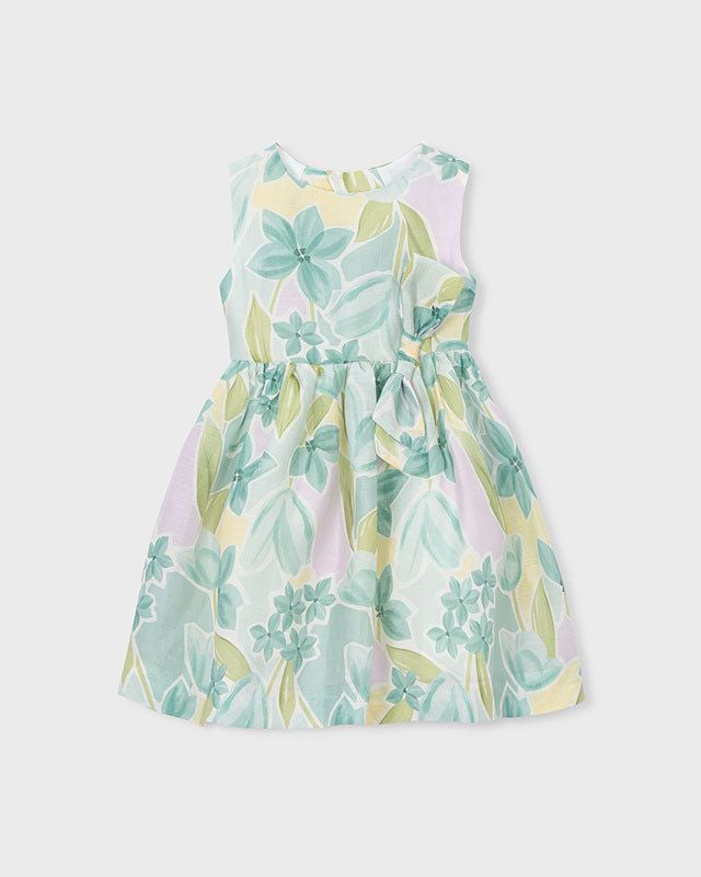 Dettaglio dell'abito cerimonia bambina Mayoral con stampa floreale verde e lilla