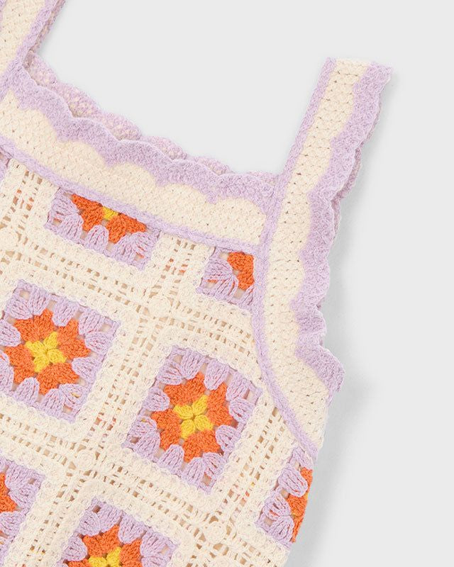 Dettaglio tessuto abito bambina maglia crochet lilla