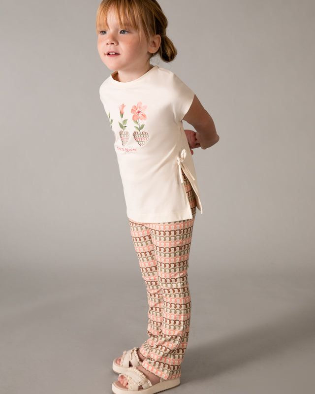 Completo bambina con maglietta e leggings a fiori e motivi geometrici