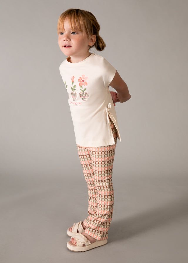 Completo bambina con maglietta e leggings a fiori e motivi geometrici