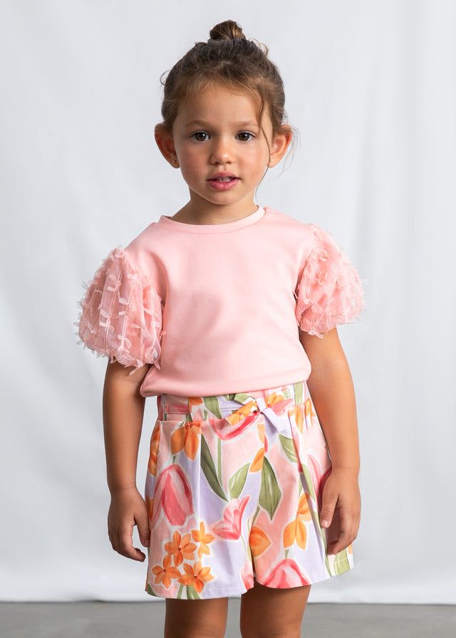 Gonna pantalone bambina Mayoral con pieghe floreali rosa e arancio