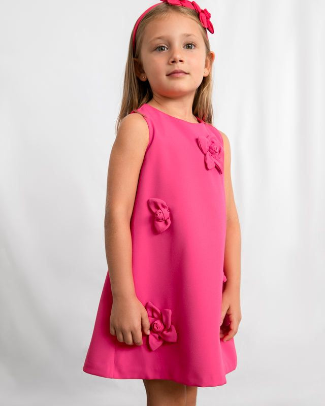 Abito rosa con fiore applicato bambina