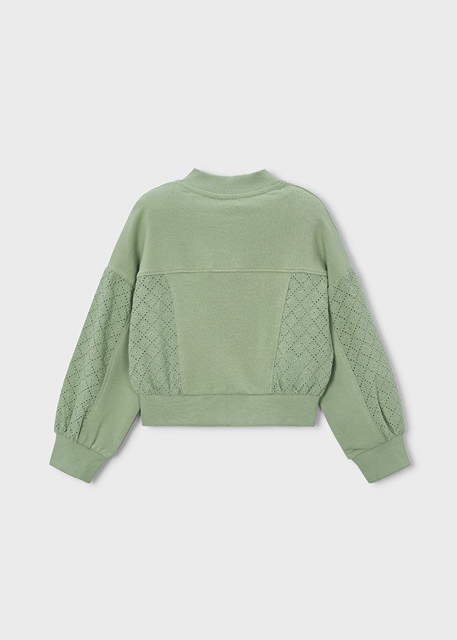 Retro della felpa bambina verde traforata