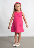 Vestito estivo rosa con fiore bambina